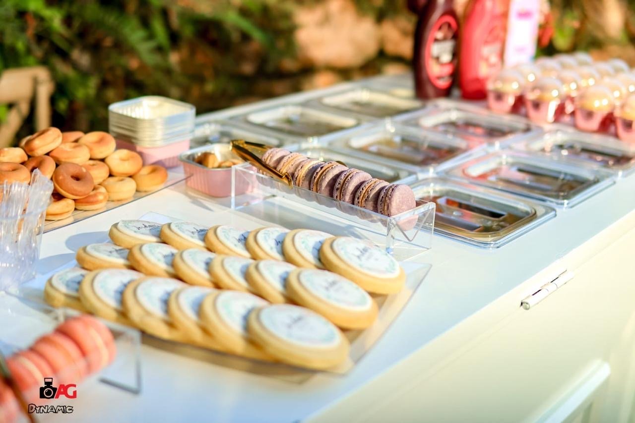 Cookies and macarons displayed on the Sweet Mischief Dessert Cart