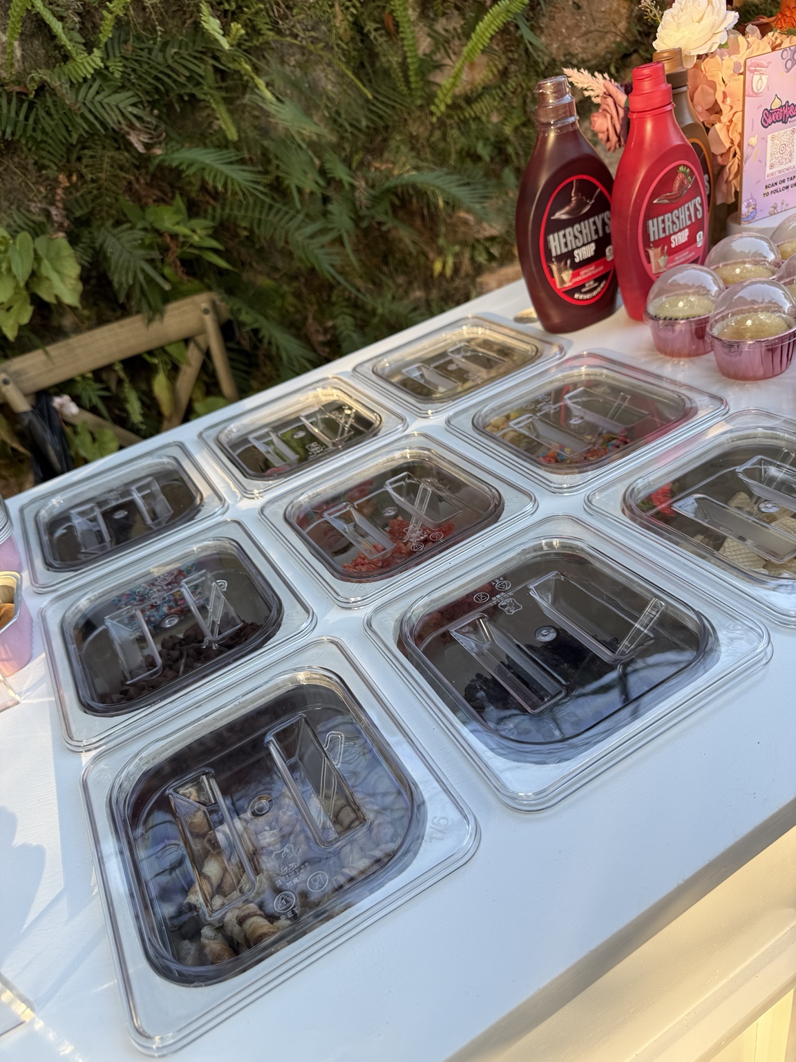 Interactive dessert cart toppings station
