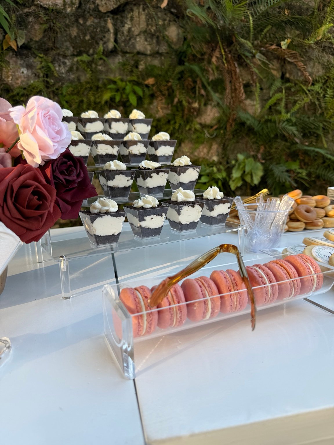 Macarons and Oreo dessert cups on a styled dessert table in Jamaica