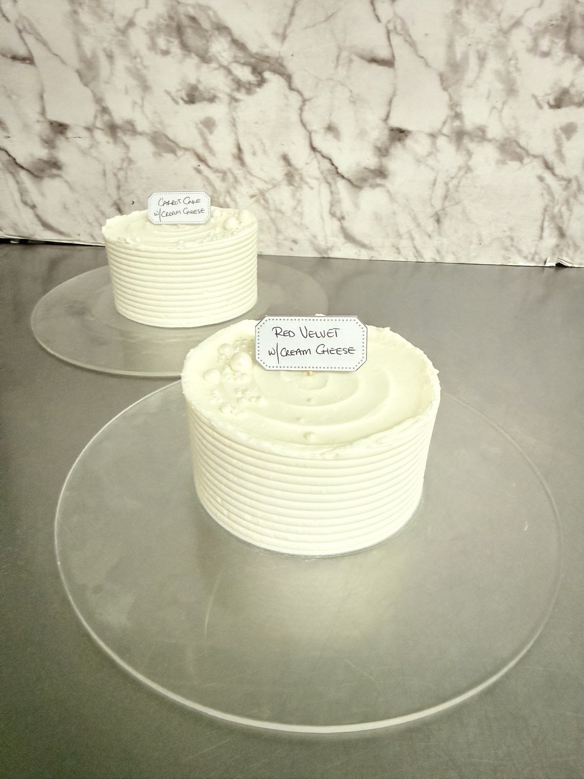 Wedding cake sample flavours including carrot cake and red velvet with cream cheese filling by Sweet Mischief JA