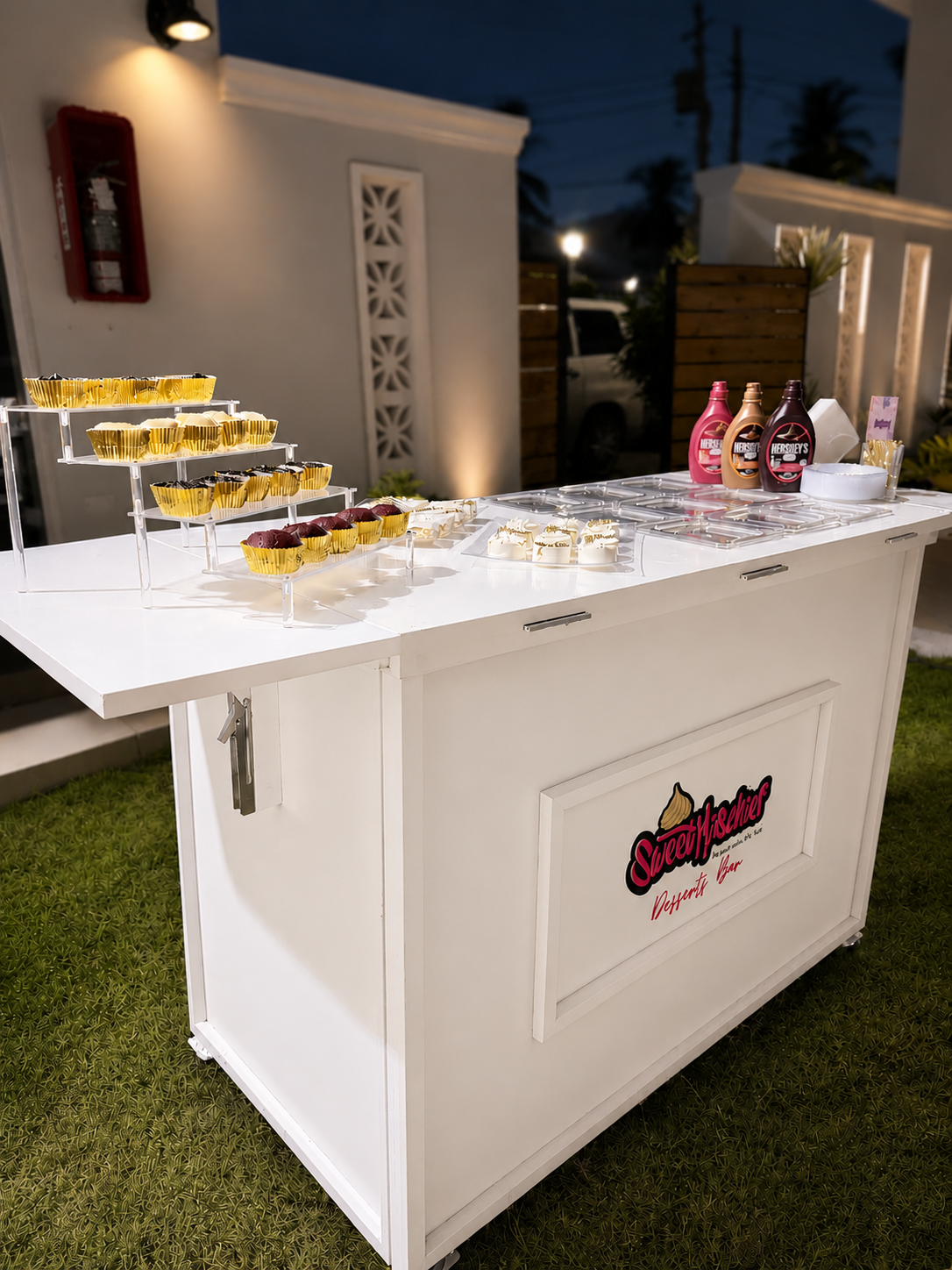 Wedding dessert cart styled with mini desserts, sauces and toppings in Jamaica by Sweet Mischief JA